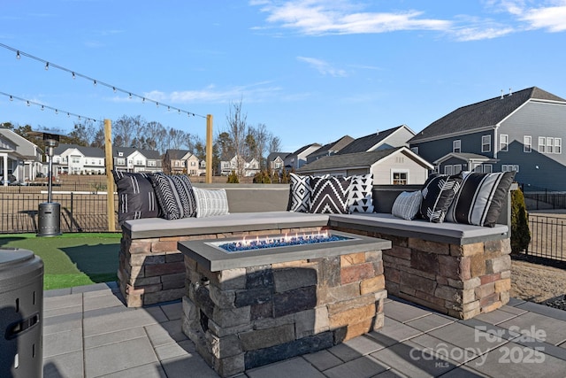 view of patio / terrace with an outdoor fire pit