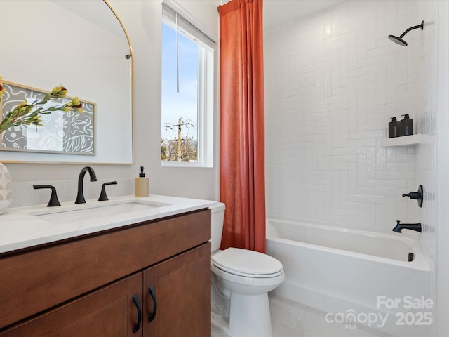 full bath featuring shower / tub combo, vanity, and toilet