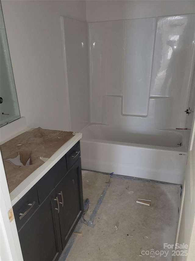 full bathroom featuring  shower combination and vanity