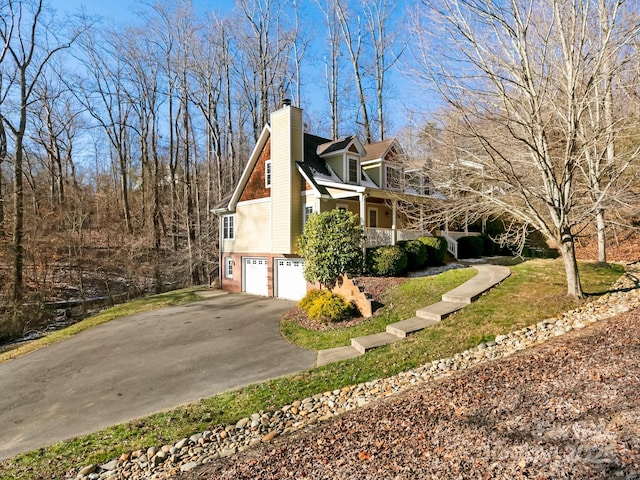 view of side of property with a garage