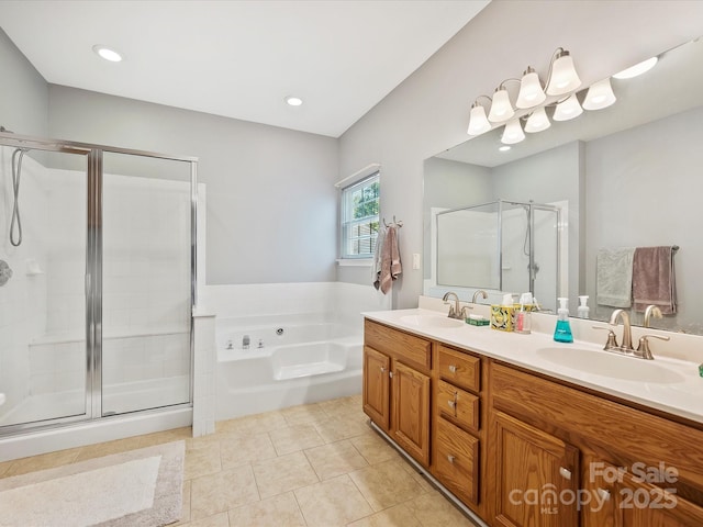 bathroom featuring tile patterned floors, vanity, and plus walk in shower