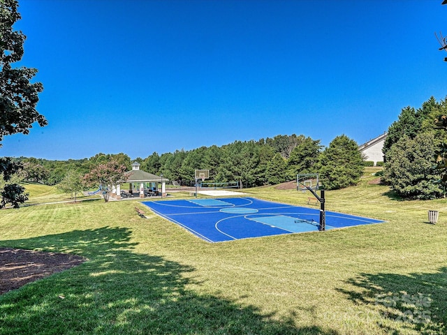 view of basketball court featuring a gazebo and a lawn