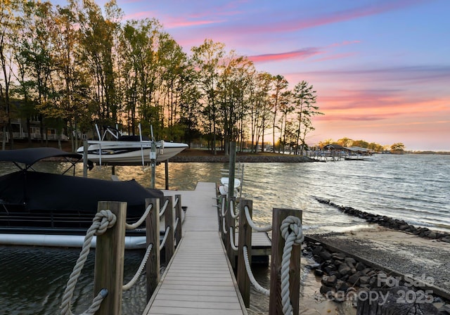 view of dock with a water view