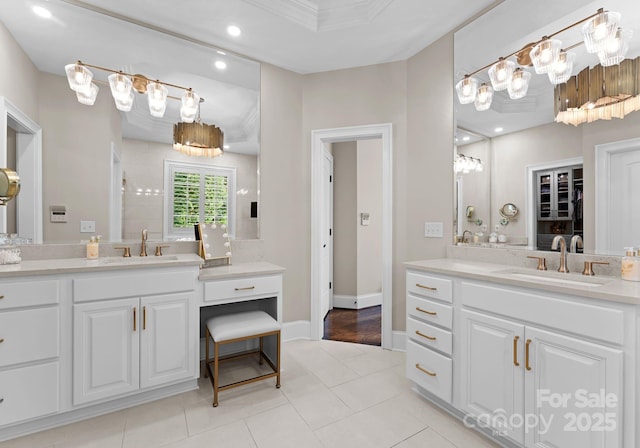 bathroom featuring vanity, crown molding, tile patterned floors, and walk in shower