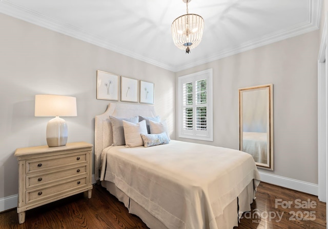 bedroom featuring a notable chandelier, ornamental molding, and dark hardwood / wood-style floors