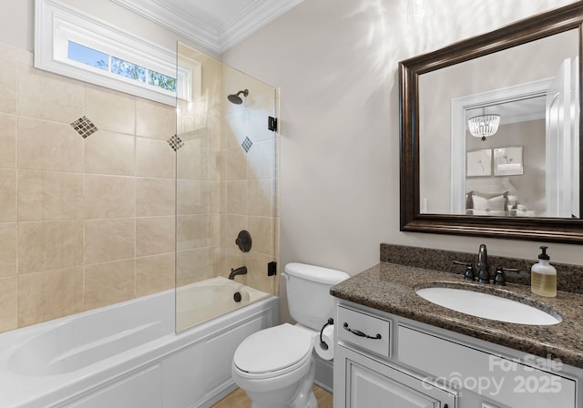 full bathroom with tiled shower / bath combo, vanity, ornamental molding, and toilet