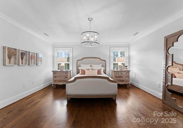 bedroom featuring ornamental molding, dark hardwood / wood-style flooring, and multiple windows