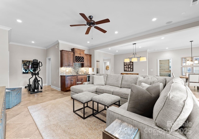 living room with light tile patterned floors, ornamental molding, and ceiling fan