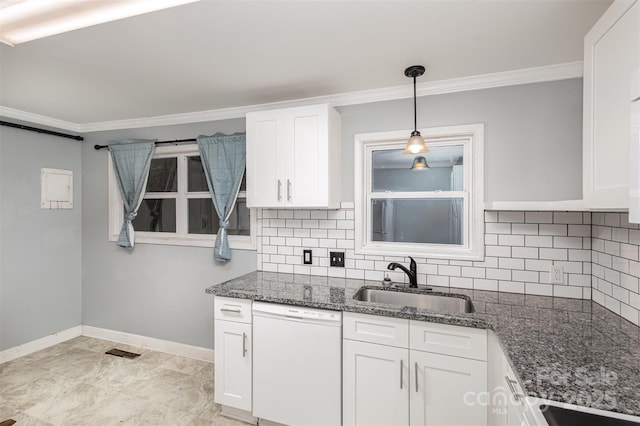 kitchen with dark stone counters, white dishwasher, sink, hanging light fixtures, and white cabinetry