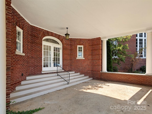 doorway to property featuring french doors