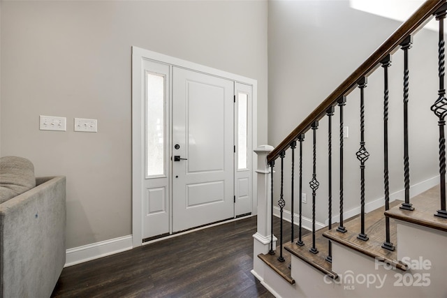 entryway featuring dark wood-type flooring