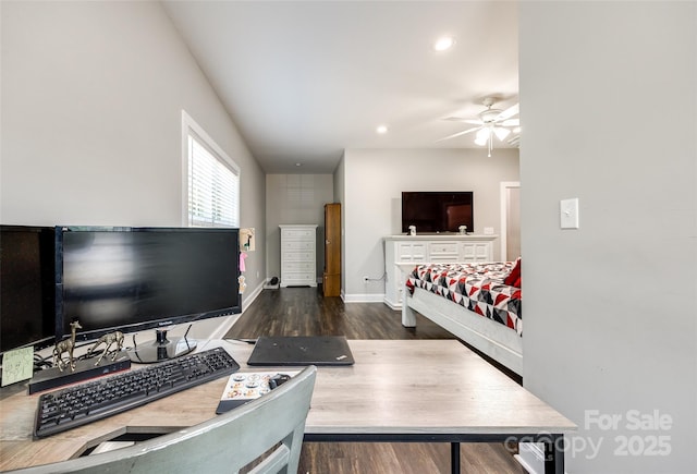 bedroom featuring dark hardwood / wood-style floors and ceiling fan