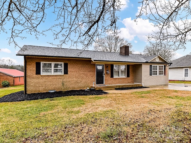 ranch-style house with a front yard