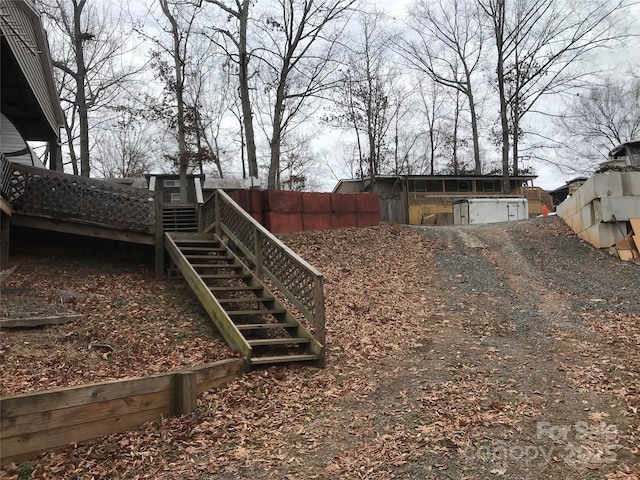 view of yard featuring a deck