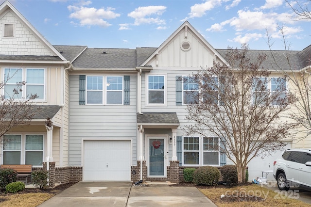 multi unit property featuring a garage