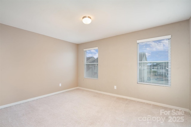 view of carpeted spare room