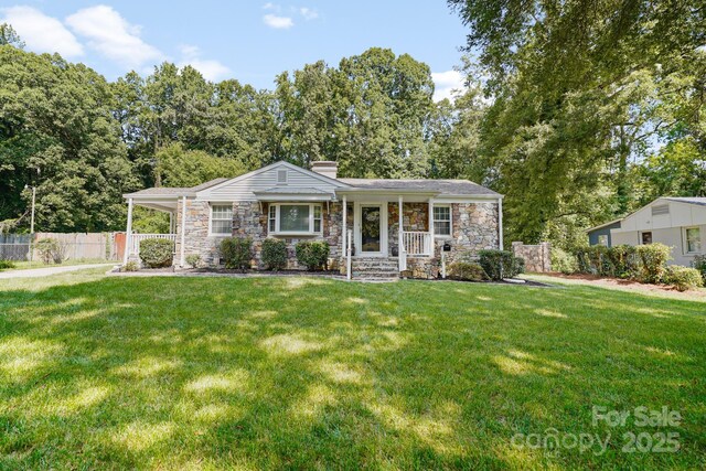 2830 Royston Rd, Charlotte, NC 28208 - ranch-style home with covered porch and a front yard