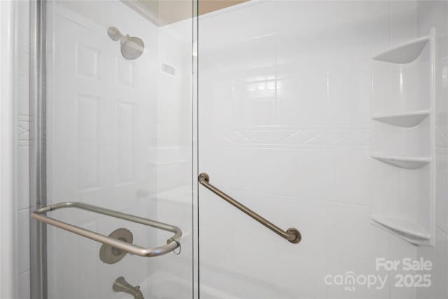 bathroom featuring walk in shower