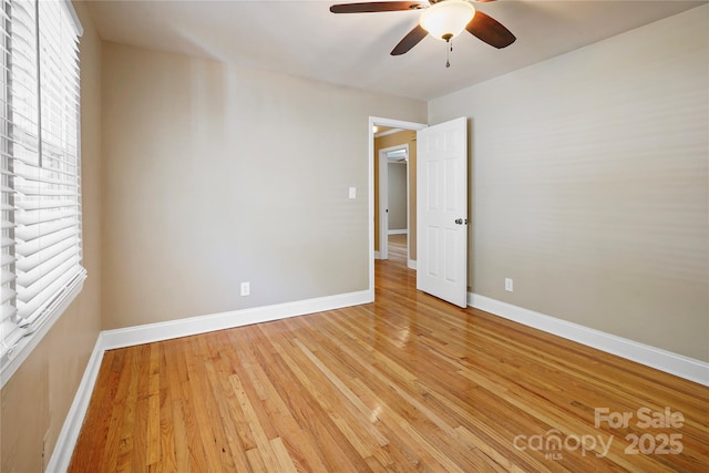 unfurnished room featuring ceiling fan and light hardwood / wood-style flooring