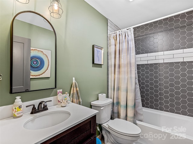 full bathroom featuring vanity, toilet, and shower / tub combo with curtain