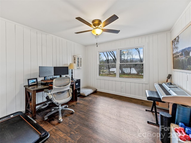 office with ceiling fan and dark wood-type flooring