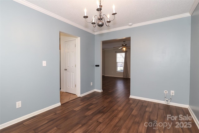 spare room with a textured ceiling, ceiling fan with notable chandelier, crown molding, and dark wood-type flooring