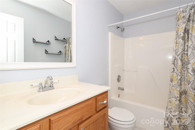 full bathroom featuring vanity, toilet, and shower / tub combo