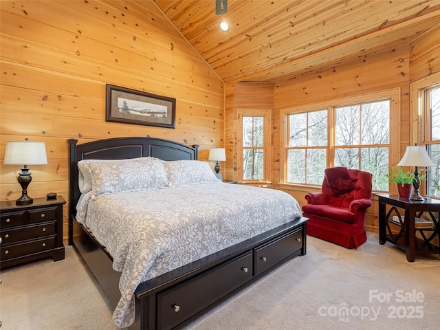 bedroom featuring wood walls, light colored carpet, wood ceiling, and lofted ceiling