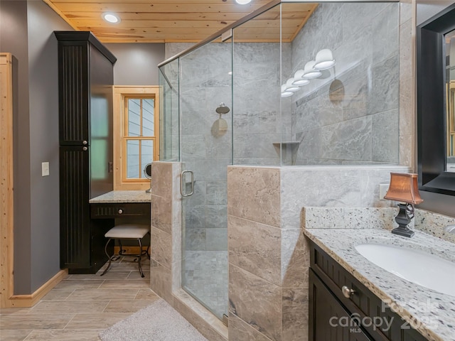 bathroom with vanity, walk in shower, and wooden ceiling