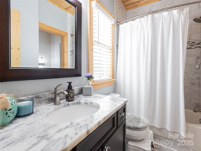 full bathroom with vanity, toilet, and shower / bath combo with shower curtain