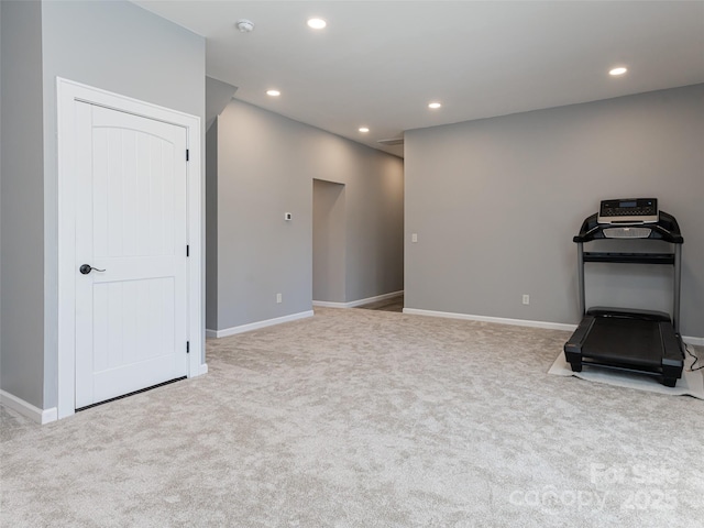 interior space featuring light colored carpet