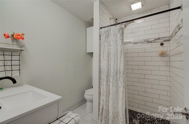 6 Candor Dr, Fletcher, NC 28732 - bathroom with a sink, toilet, and a tile shower