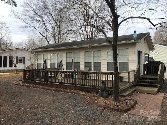 135/137 Indian Harbor Trl Unit E16/17, Mount Gilead, NC 27306 - view of front facade featuring a deck