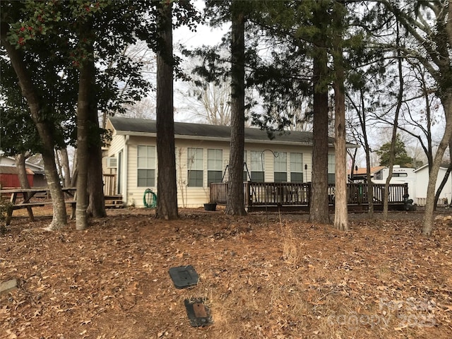 135/137 Indian Harbor Trl Unit E16/17, Mount Gilead, NC 27306 - back of house with a deck