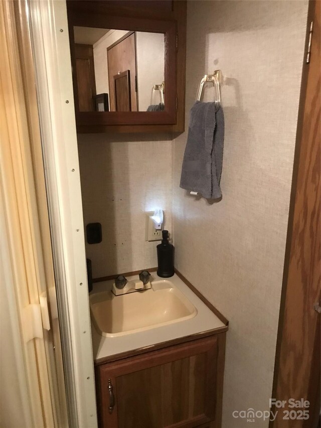 135/137 Indian Harbor Trl Unit E16/17, Mount Gilead, NC 27306 - bathroom featuring vanity