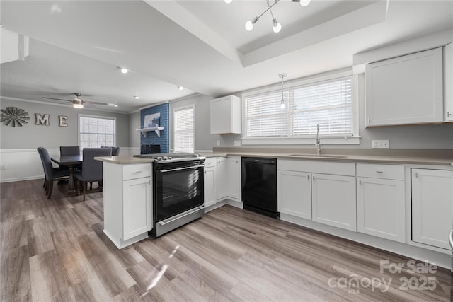 kitchen featuring a sink, electric range oven, black dishwasher, white cabinetry, and light wood-type flooring