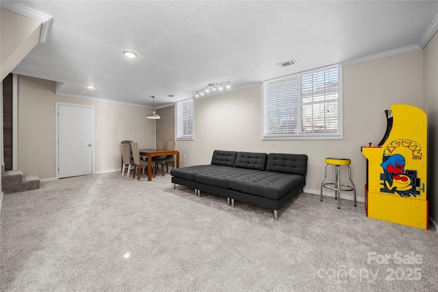 interior space with carpet, visible vents, baseboards, stairs, and crown molding