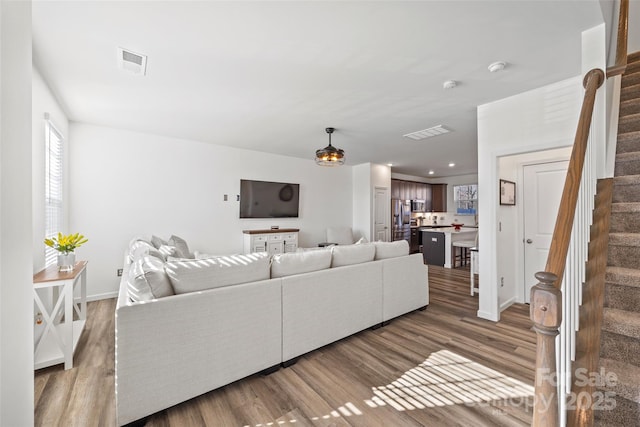 living room with wood-type flooring