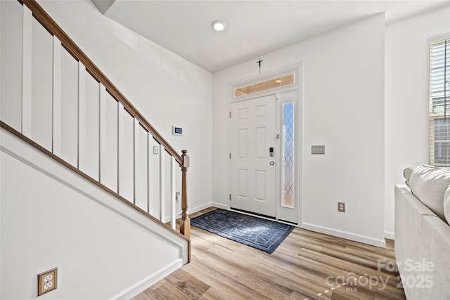 foyer entrance featuring light hardwood / wood-style flooring