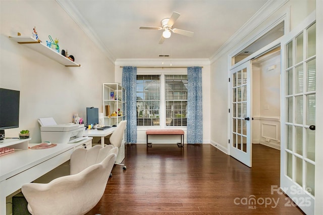 home office with french doors, crown molding, and dark wood-type flooring