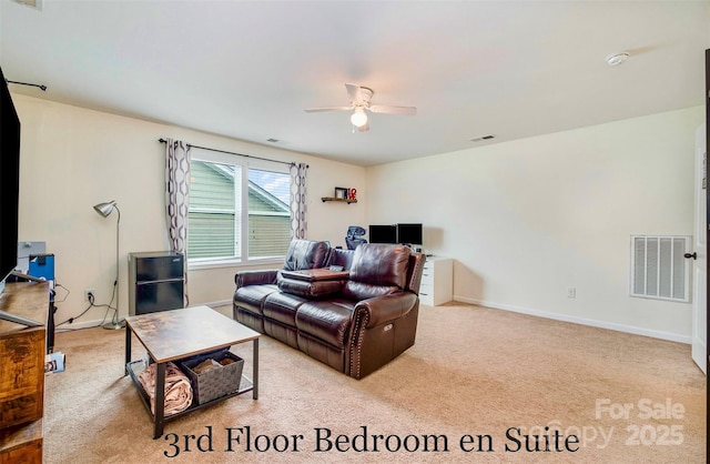 living room featuring light colored carpet and ceiling fan