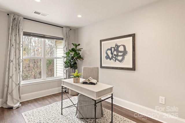 office area with hardwood / wood-style floors