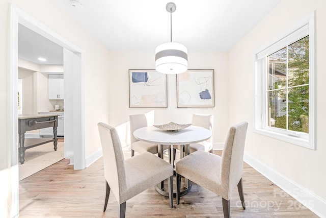 dining area featuring light hardwood / wood-style floors