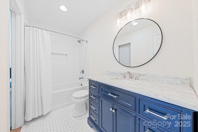 full bathroom featuring vanity, shower / bathtub combination with curtain, tile patterned floors, and toilet