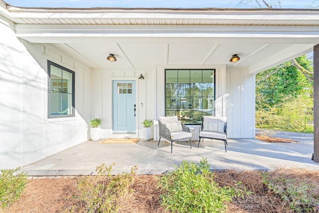 entrance to property with a patio area