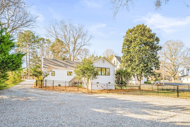 711 Concord Rd, Davidson, NC 28036 - modern farmhouse style home with a fenced front yard and driveway