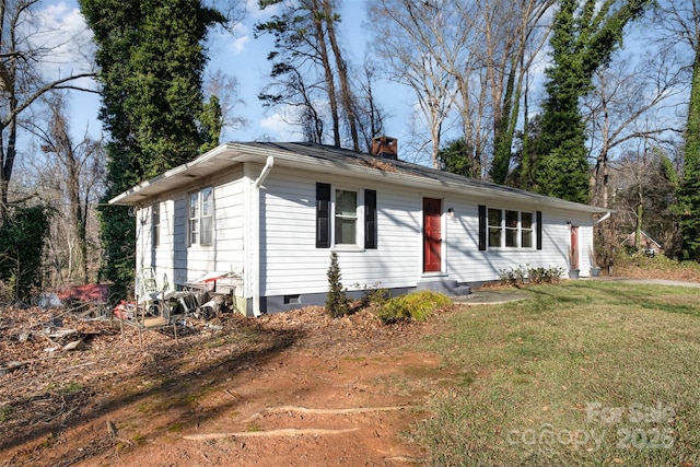 ranch-style house with a front yard