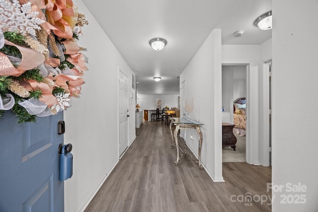 hallway featuring light hardwood / wood-style floors