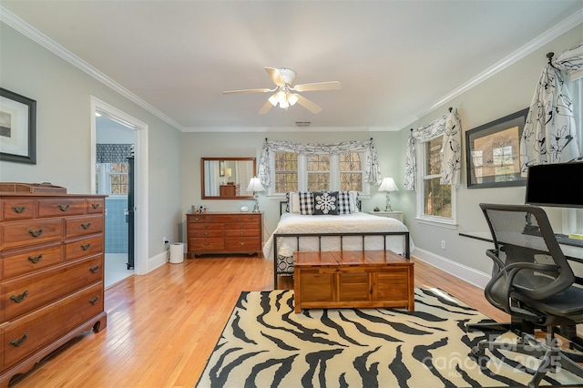 bedroom featuring crown molding, ceiling fan, and light wood-type flooring