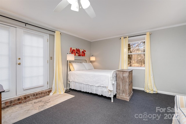 carpeted bedroom with ornamental molding and ceiling fan